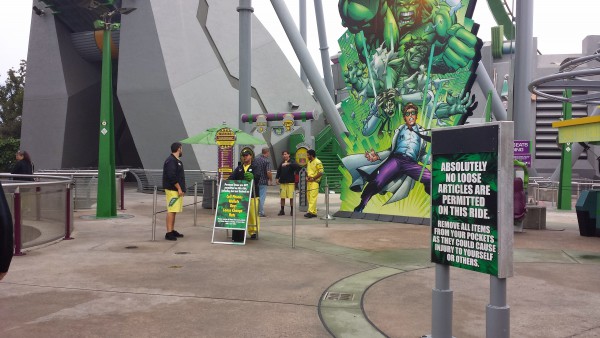 Ride Operators in front of The Incredible Hulk Attractions ensure that all loose articles are secured in a locker before boarding. / 20141114_090801-EFFECTS.jpg 20141114_090801-EFFECTS.jpg